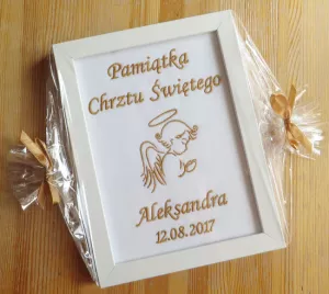 Baptism souvenirs in frame