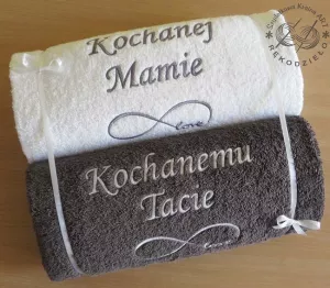 - 70x140 cm embroidered towels with one-color graphic and short dedication