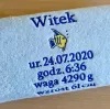 Ręcznik z wyhaftowaną metryczką